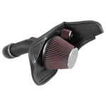 K&N 63-3084 AirCharger intake system with black HDPE tube, red conical filter, and custom heat shield.