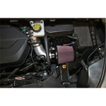 K&N Typhoon intake system with silver mandrel-bent aluminum tube, red conical air filter, and black heat shield.