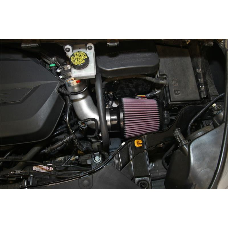 K&N Typhoon intake system with silver mandrel-bent aluminum tube, red conical air filter, and black heat shield.