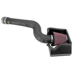 K&N 57-2585 performance air intake system with HDPE tube, conical oiled cotton filter, and black heat shield.