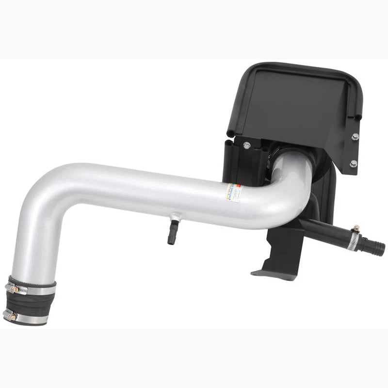 K&N Typhoon performance intake system with silver mandrel-bent aluminum tube, red conical air filter, and black heat shield.
