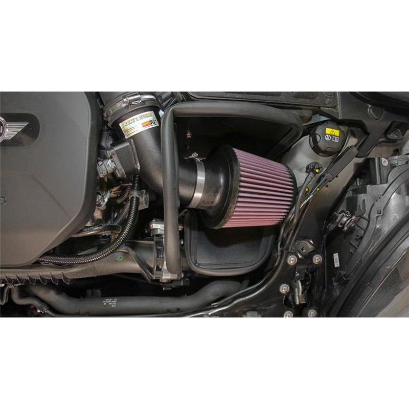 K&N Typhoon intake system with a black aluminum tube, red conical air filter, and custom heat shield.
