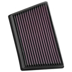 K&N 33-3073 red oiled cotton replacement air filter in a black rectangular frame.