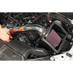 K&N 77 Series cold air intake system featuring a polished aluminum tube and red oiled cotton conical air filter.