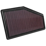 K&N 33-5049 High-Flow replacement air filter with red oiled cotton media and black flexible frame.
