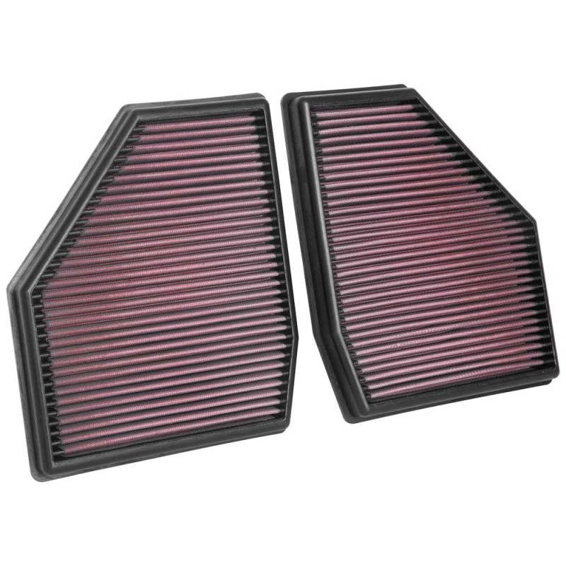 Set of two K&N 33-3128 replacement air filters with red pleated oiled cotton media and black flexible frames.