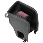 K&N Typhoon air intake system with silver mandrel-bent aluminum tube, red conical filter, and black powder-coated heat shield