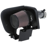 K&N Typhoon air intake system featuring a mandrel-bent aluminum intake tube and silver conical air filter.