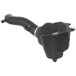 K&N AirCharger performance intake with black HDPE tube, enclosed air box, and red oiled cotton conical air filter.