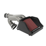 K&N performance air intake system with high-flow intake tube, heat shield, and red washable cotton air filter.