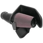 K&N AirCharger performance intake kit with black HDPE tube, heat shield, and red oiled cotton conical air filter.