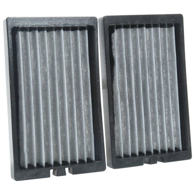 Set of two white pleated K&N washable cabin air filters with black frames for 2018-2025 Jeep Wrangler and Gladiator.