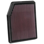 K&N high-flow drop-in air filter with red pleated oiled cotton media and a durable black molded rubber frame.