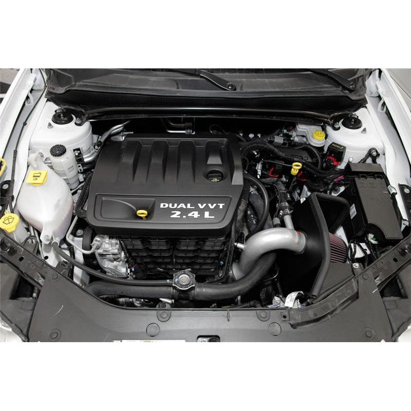 K&N 69 Series Typhoon silver intake system with mandrel-bent aluminum tube, conical filter, and heat shield.