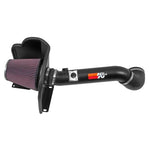 K&N 77 Series air intake kit with mandrel-bent aluminum tube, custom heat shield, and red conical oiled cotton filter.