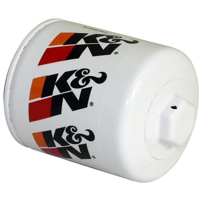 K&N HP-1002 Performance Gold oil filter showing the white canister and 1-inch welded hex nut on top.