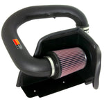 K&N 57-1521 intake kit for 1991-1995 Jeep Wrangler featuring black HDPE tube, red conical filter, and custom heat shield