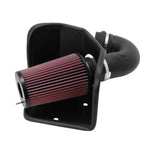 K&N 57 Series performance intake kit with black HDPE tube and red oiled cotton filter for Dodge Ram 5.9L diesel.