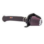 K&N 57 Series performance intake system with black HDPE induction tube and red oiled cotton conical air filter.