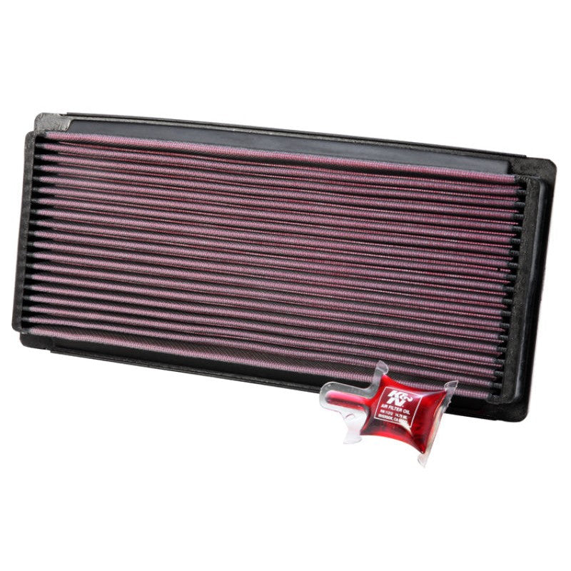 K&N 33-2023 drop-in replacement air filter with red oiled cotton media and a black rubber frame seal.