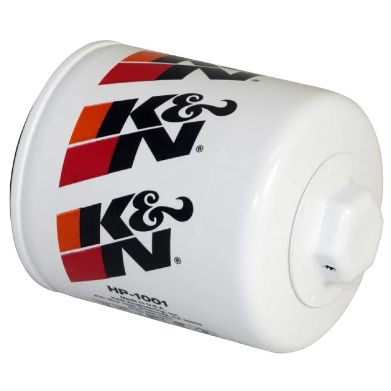 White K&N HP-1001 Performance Gold canister oil filter with a 1-inch welded hex nut on the top.