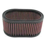 K&N E-3341 oval air filter featuring pink oiled cotton media and black rubber structural seals.