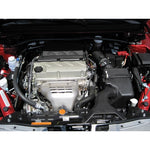 K&N 33-2285 drop-in replacement high-flow air filter with pleated red oiled cotton media and black frame.