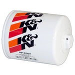 White K&N HP-2002 performance oil filter with a welded 1-inch hex nut for easy wrench removal.