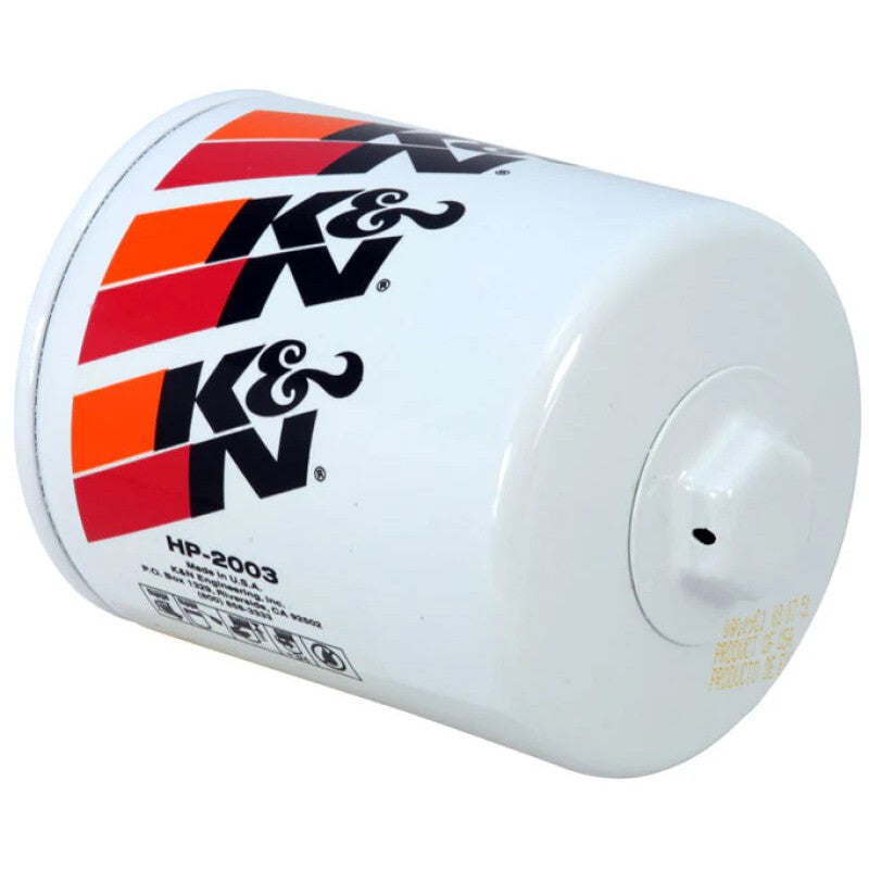 K&N HP-2003 white canister oil filter with 1-inch welded removal hex nut and black K&N logo.
