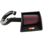 K&N 77 Series intake kit with silver aluminum tube, red oiled air filter, and black heat shield.