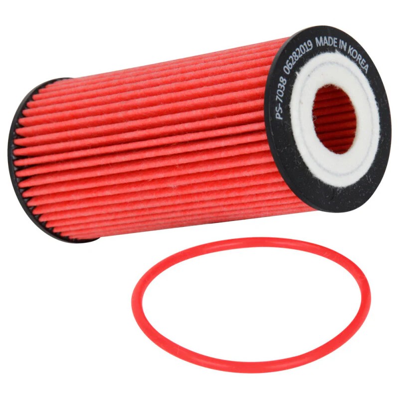 K&N HP-7038 performance cartridge oil filter with pleated filtration media and replacement rubber gaskets.