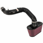K&N 69-8433TTK Typhoon short ram intake with black powder-coated aluminum tube and red conical air filter.