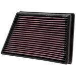 K&N 33-2991 replacement high-flow air filter featuring red oiled cotton media in a black composite frame.