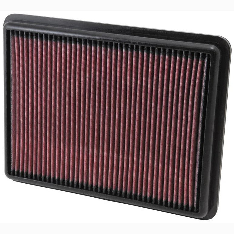 K&N 33-2493 high-flow replacement air filter with red pleated oiled cotton media and black flexible gasket.