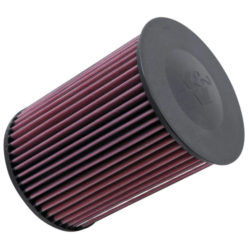 K&N E-2993 high-flow replacement air filter with red pleated oiled cotton media and black rubber sealing gaskets.