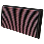 K&N 33-2670 High-Flow replacement engine air filter with red pleated cotton media and a black rubberized frame.