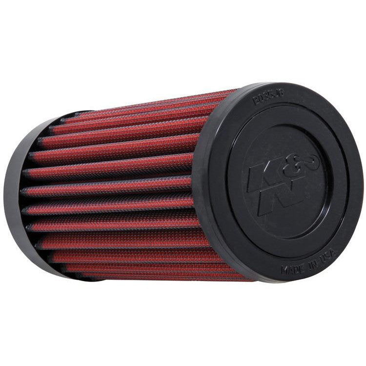 K&N E-4552 cylindrical industrial air filter with red pleated media and black molded rubber flange.