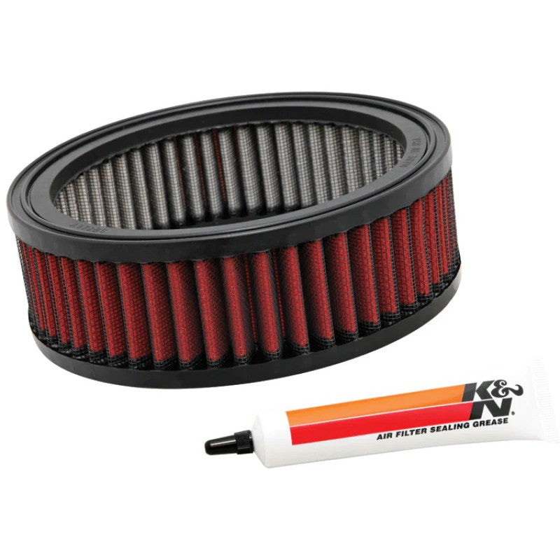 Round K&N E-4665 industrial air filter with white oil-free synthetic media and sealing grease tube