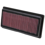 Rectangular K&N replacement panel air filter with pleated red oiled cotton media and a black flexible frame.
