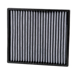 K&N VF2007 washable cabin air filter featuring white pleated synthetic media and a black flexible frame.