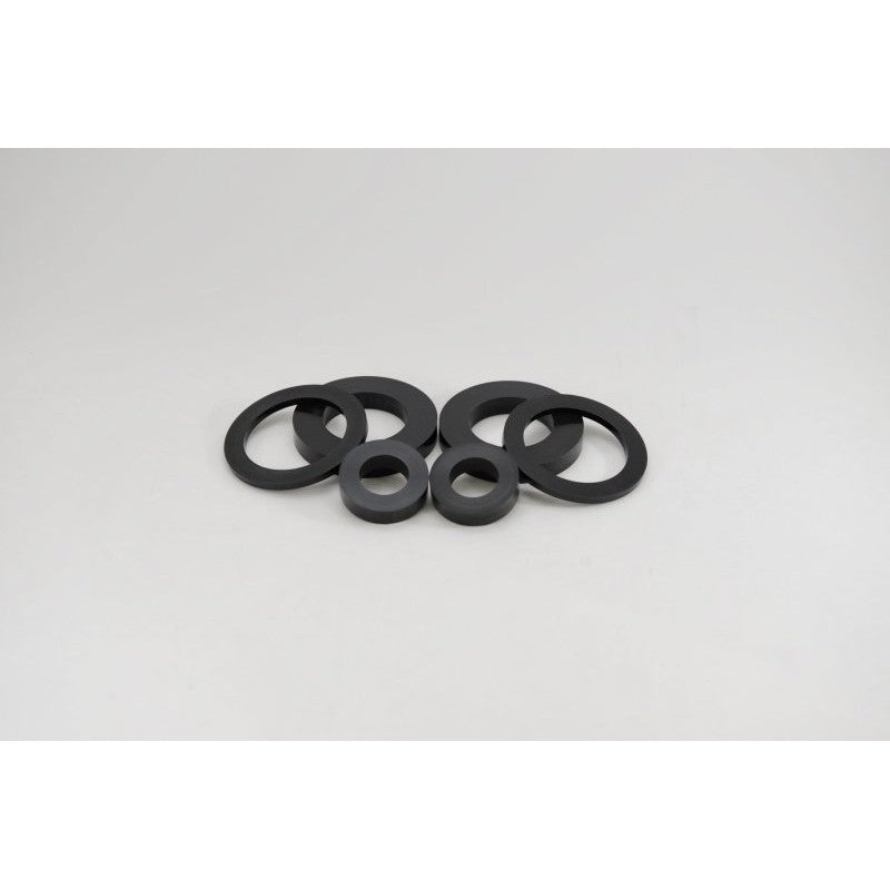 Set of two Kartboy high-durometer rear differential bushings for 2002-2007 Subaru WRX and STi.