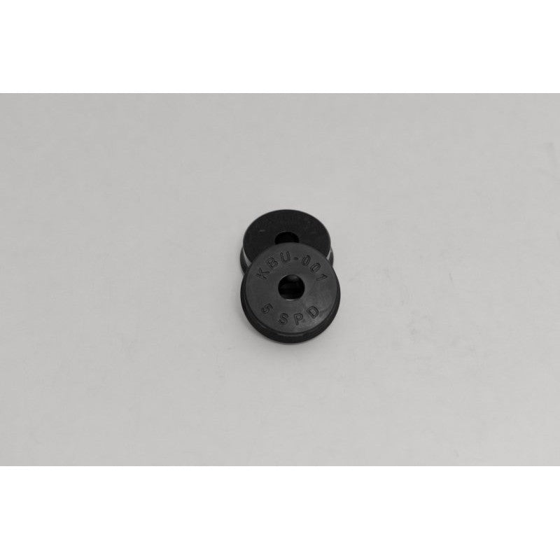 Two-piece yellow polyurethane Kartboy front shifter bushings for Subaru 5-speed manual transmissions.