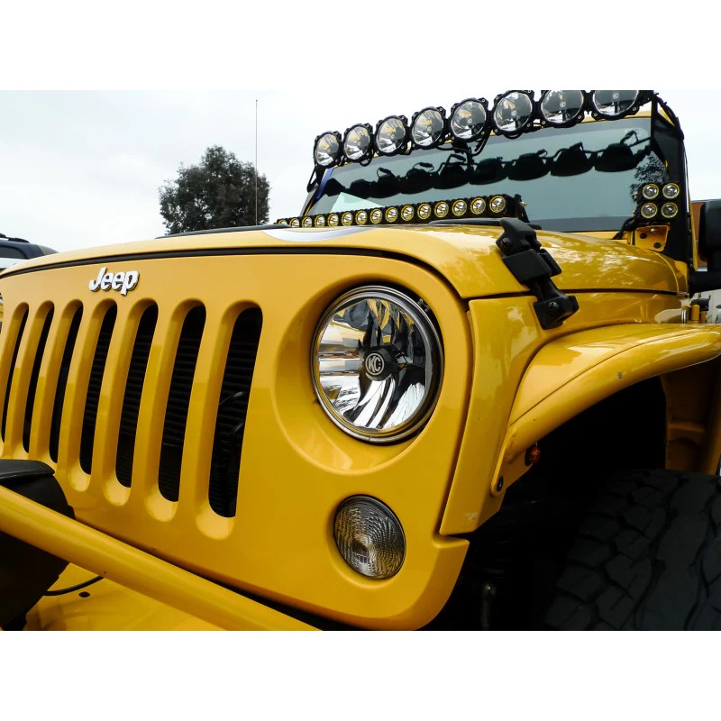 Single 7-inch KC HiLiTES Gravity LED replacement headlight with polished reflectors and a black die-cast housing.