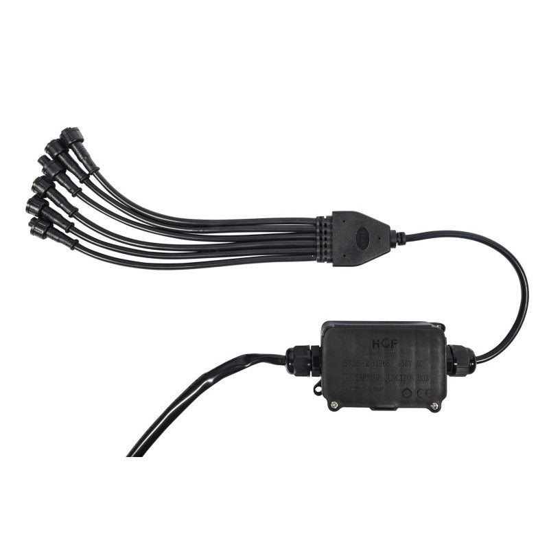 Six black die-cast aluminum RGB LED rock light pods with waterproof wiring harness and Bluetooth control module.