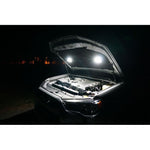 KC HiLiTES 355 Cyclone 2-inch LED under hood lighting kit featuring two round flood lights, wiring, and a toggle switch.
