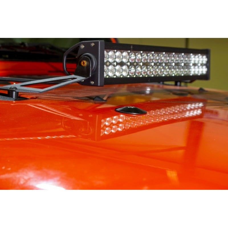 Black powdercoated stainless steel hood bumper delete plates for 1997-2019 Jeep Wrangler TJ and JK.