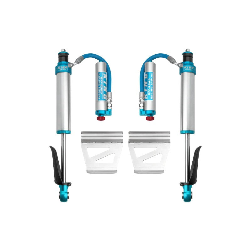 Pair of King Shocks 2.5 inch rear remote reservoir shocks with blue compression adjusters and braided hoses.
