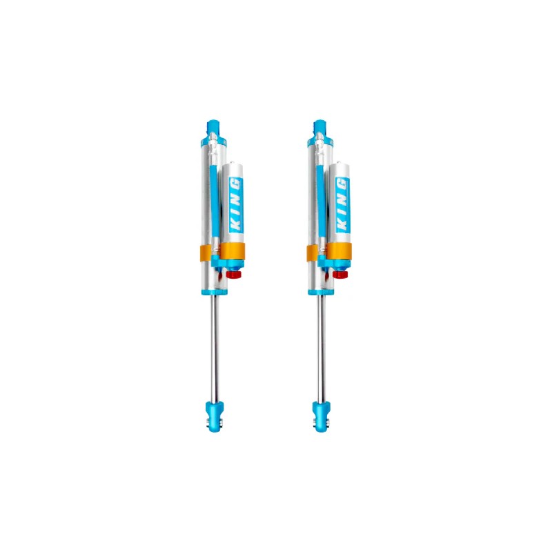 King Shocks 2.5 series blue and silver rear shocks with remote reservoirs and compression adjusters for Ford Super Duty.