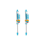 King Shocks 2.5 series blue and silver rear shocks with remote reservoirs and compression adjusters for Ford Super Duty.