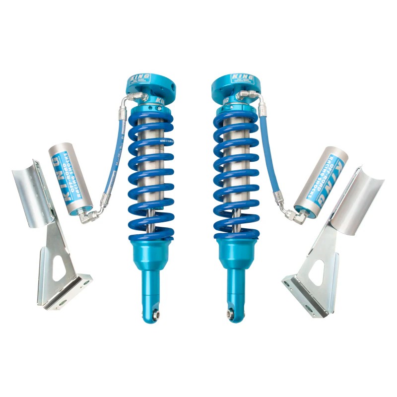 Pair of King Shocks 2.5 front remote reservoir coilovers with blue springs and silver bodies for 2005-2015 Toyota Tacoma
